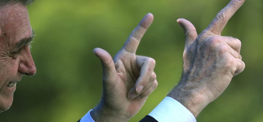 Brazil's President-elect Jair Bolsonaro gestures at the graduation of officers of the School of Aeronautical Specialists in Guaratingueta, Brazil November 30, 2018.   REUTERS/Paulo Whitaker