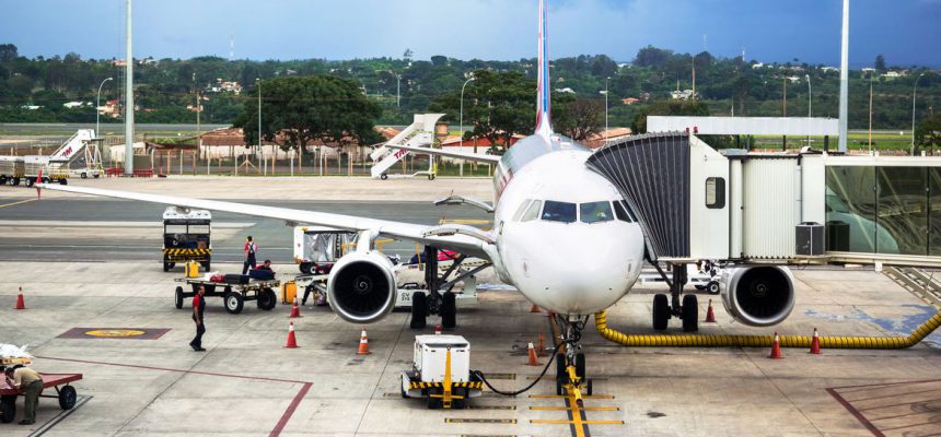 Brasilia, Brazil - November 20, 2015: TAM Airlines Airbus 320 parked at airport in Brasilia, capital of Brazil. TAM is the Brazilian brand of Latam Airlines and the largest Brazilian airline.